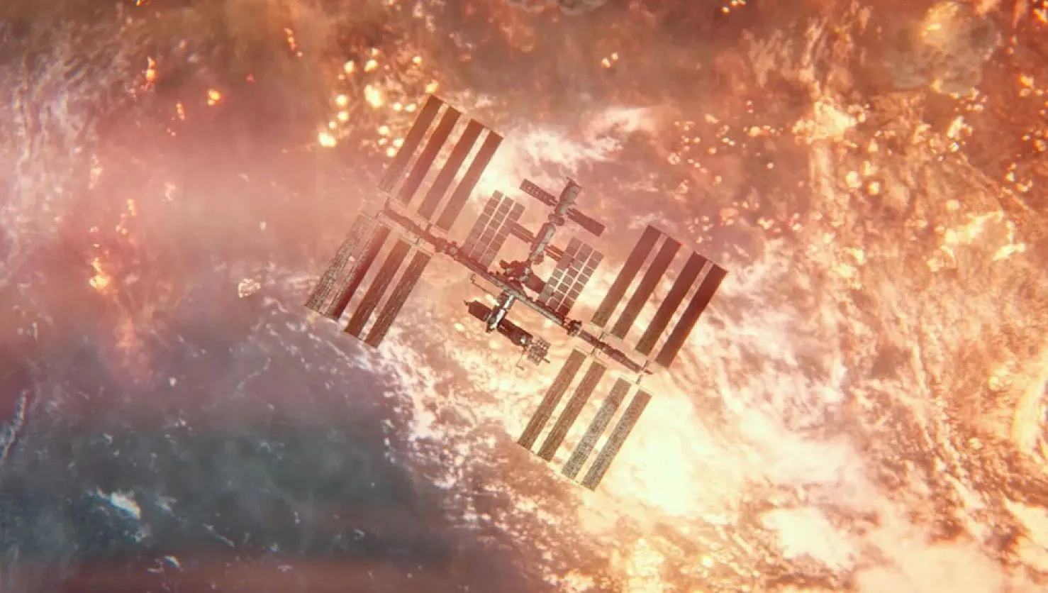Draufsicht auf eine Raumstation über der Erde, mit Bränden und Explosionen auf der Planetenoberfläche.