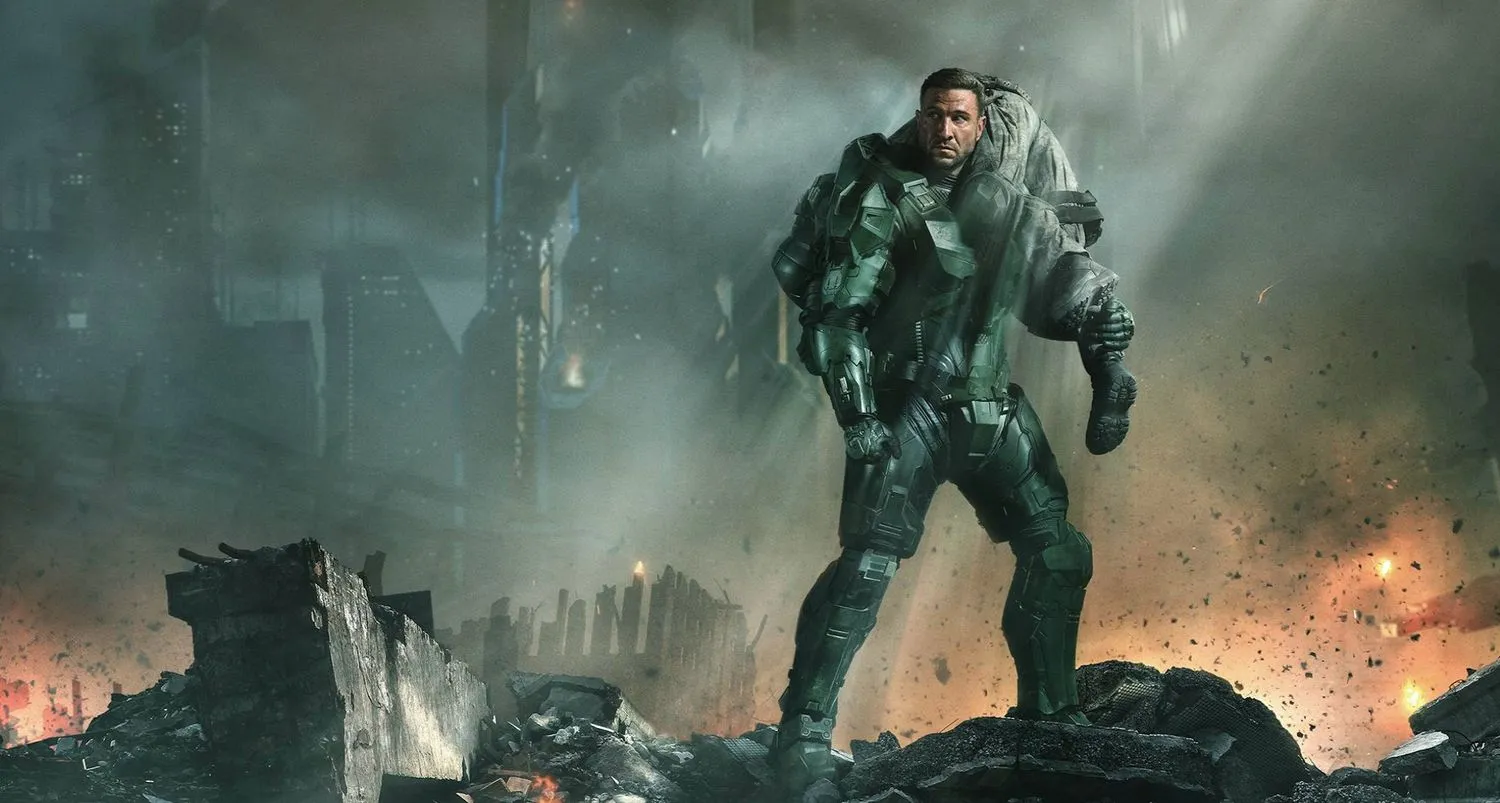 Illustration eines Mannes in einer futuristischen grünen Rüstung in einer zerbombten Stadt.
