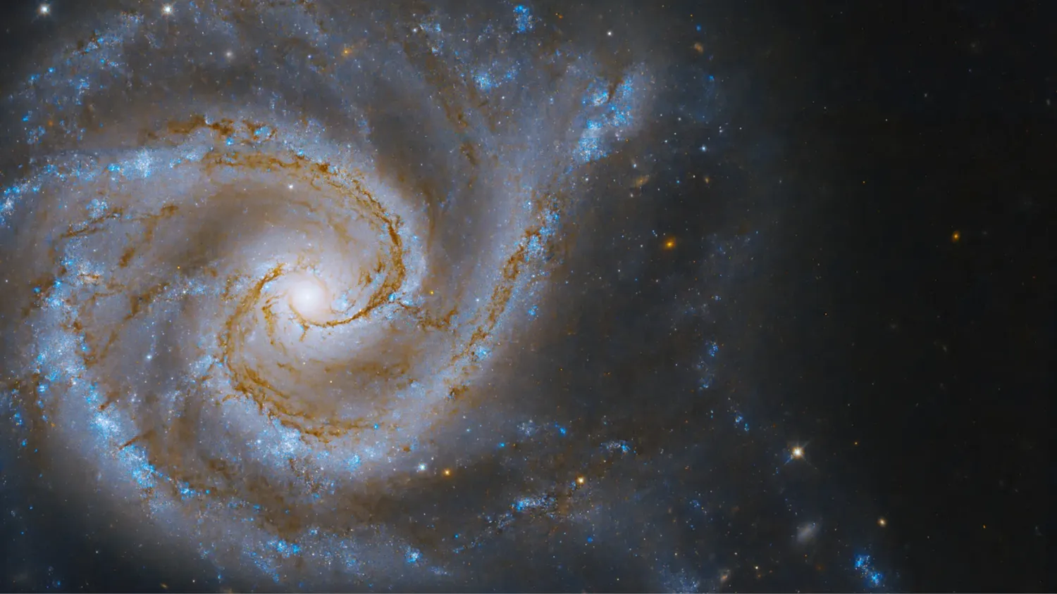 eine weiße und hellblaue Gasspirale im Weltraum, umgeben von Sternen