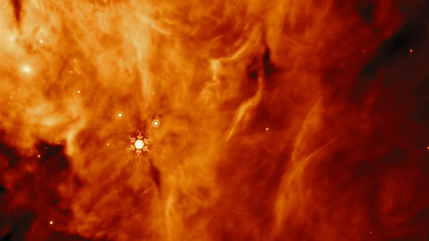 Ein Bild einer Region parallel zu dem massiven Protostern IRAS23385 (Stern nicht sichtbar)